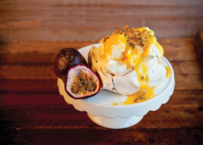 Drizzle on top of Passion Fruit Pavlova
